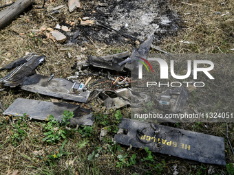 Debris is covering the ground at a house that is partially destroyed by a Russian drone attack in Orikhiv, Zaporizhzhia region, southeastern...