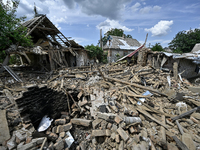 The rubble is covering the ground near a house that is partially destroyed by a Russian drone attack in Orikhiv, Zaporizhzhia region, southe...