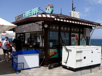 A generator is being installed outside a coffee shop at the seaside in Odesa, Ukraine, on June 11, 2024. NO USE RUSSIA. NO USE BELARUS. (