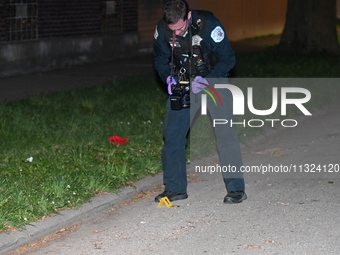 A 49-year-old male is being shot and critically wounded in a shooting during a food delivery in Chicago, Illinois, United States, on June 12...