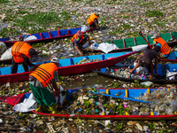 Joint officers are cleaning up plastic waste from the heavily polluted Citarum River in Batujajar, Bandung, West Java, Indonesia, on June 12...