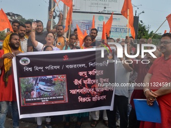 Biswa Hindu Parishad (BJP) and Bajrang Dal activists are shouting slogans as they protest in Siliguri, India, on June 12, 2024, against the...