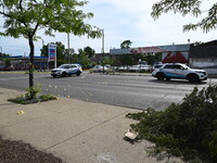 Chicago police and the crime scene unit are investigating the shooting and putting down evidence markers for shell casings, with over 80 evi...