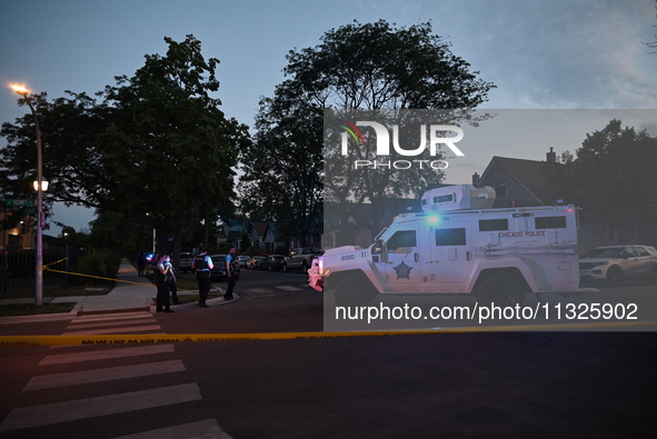 The Chicago Police SWAT Team is arriving at residences to search for suspects involved in the shooting of a 67-year-old male food vendor in...