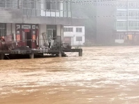 The flood damage is occurring in Gaozhai village, Qiandongnan County, Guizhou province, China, on the morning of June 12, 2024. (