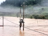 The flood damage is occurring in Gaozhai village, Qiandongnan County, Guizhou province, China, on the morning of June 12, 2024. (