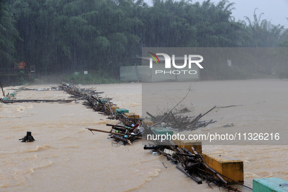 The Datantun Bridge is flooding in Liuzhou, China, on June 13, 2024. 