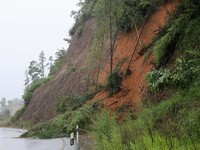 A slope is collapsing at the Sanmatun road section in Liuzhou City, Guangxi Province, China, on June 13, 2024. (