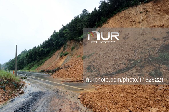 A slope is collapsing at the Sanmatun road section in Liuzhou City, Guangxi Province, China, on June 13, 2024. 