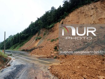 A slope is collapsing at the Sanmatun road section in Liuzhou City, Guangxi Province, China, on June 13, 2024. (