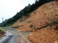 A slope is collapsing at the Sanmatun road section in Liuzhou City, Guangxi Province, China, on June 13, 2024. (