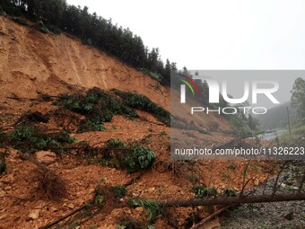 A slope is collapsing at the Sanmatun road section in Liuzhou City, Guangxi Province, China, on June 13, 2024. (