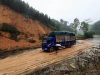 A slope is collapsing at the Sanmatun road section in Liuzhou City, Guangxi Province, China, on June 13, 2024. (