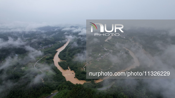 The river water is becoming turbid and the water level is rising in Dajiang Town, Liuzhou, China, on June 13, 2024. 