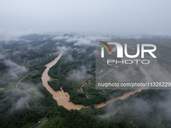 The river water is becoming turbid and the water level is rising in Dajiang Town, Liuzhou, China, on June 13, 2024. (