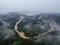 The river water is becoming turbid and the water level is rising in Dajiang Town, Liuzhou, China, on June 13, 2024. (