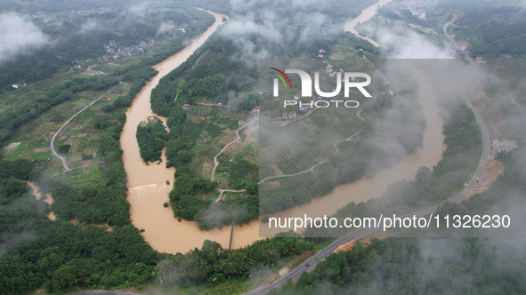 The river water is becoming turbid and the water level is rising in Dajiang Town, Liuzhou, China, on June 13, 2024. 