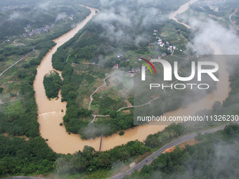 The river water is becoming turbid and the water level is rising in Dajiang Town, Liuzhou, China, on June 13, 2024. (