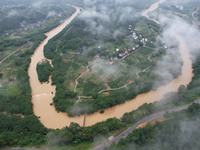 The river water is becoming turbid and the water level is rising in Dajiang Town, Liuzhou, China, on June 13, 2024. (