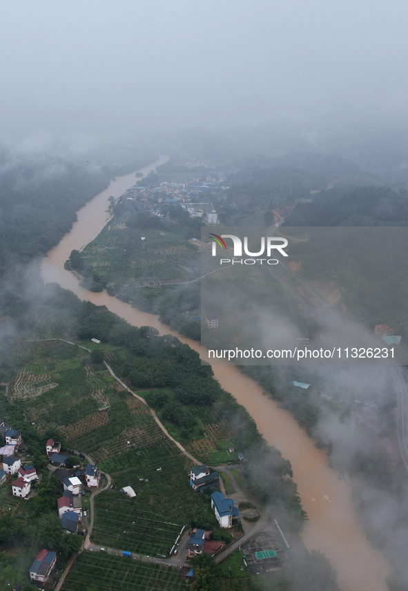 The river water is becoming turbid and the water level is rising in Dajiang Town, Liuzhou, China, on June 13, 2024. 