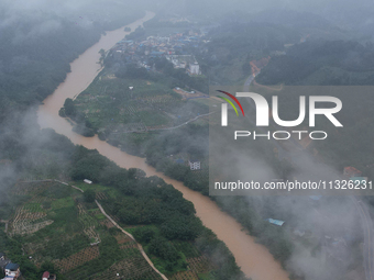 The river water is becoming turbid and the water level is rising in Dajiang Town, Liuzhou, China, on June 13, 2024. (