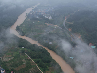 The river water is becoming turbid and the water level is rising in Dajiang Town, Liuzhou, China, on June 13, 2024. (