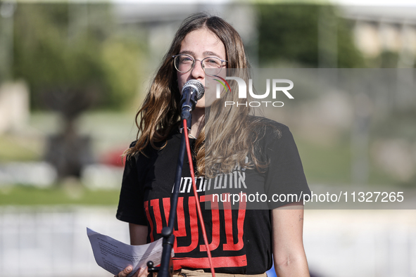 Students holding images of kidnapped Israelis rally, calling on the Israeli government to stop the war in Gaza and bring back the hostages,...