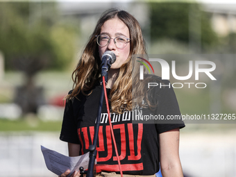 Students holding images of kidnapped Israelis rally, calling on the Israeli government to stop the war in Gaza and bring back the hostages,...