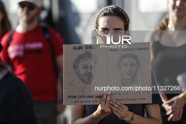 Students holding images of kidnapped Israelis rally, calling on the Israeli government to stop the war in Gaza and bring back the hostages,...