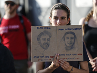 Students holding images of kidnapped Israelis rally, calling on the Israeli government to stop the war in Gaza and bring back the hostages,...