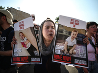 Students holding images of kidnapped Israelis rally, calling on the Israeli government to stop the war in Gaza and bring back the hostages,...