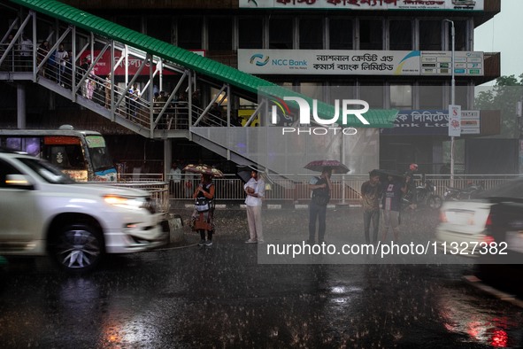 After days of intense heat, Dhaka city witnessed heavy rain and thunderstorms on Thursday, June 13, 2024. 