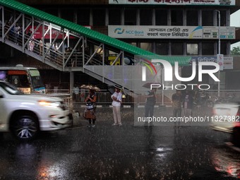 After days of intense heat, Dhaka city witnessed heavy rain and thunderstorms on Thursday, June 13, 2024. (