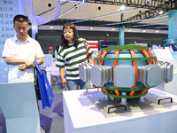 A model of the Honghuang 70 full high-temperature superconducting Tokamak device is on display at The 10th China (Shanghai) International Te...