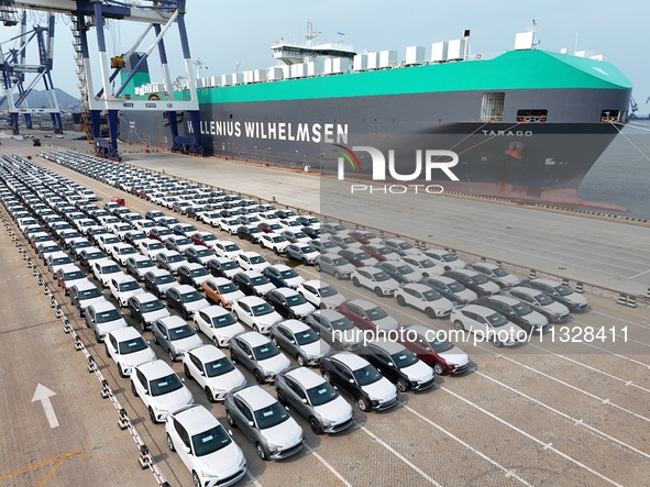 Chinese domestic vehicles are being assembled at Yantai Port in Shandong province, in Yantai, China, on June 13, 2024, waiting to be loaded...