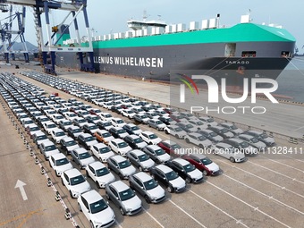 Chinese domestic vehicles are being assembled at Yantai Port in Shandong province, in Yantai, China, on June 13, 2024, waiting to be loaded...