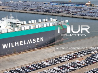 Chinese domestic vehicles are being assembled at Yantai Port in Shandong province, in Yantai, China, on June 13, 2024, waiting to be loaded...