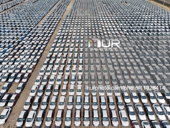 Chinese domestic vehicles are being assembled at Yantai Port in Shandong province, in Yantai, China, on June 13, 2024, waiting to be loaded...