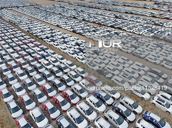 Chinese domestic vehicles are being assembled at Yantai Port in Shandong province, in Yantai, China, on June 13, 2024, waiting to be loaded...