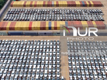 Chinese domestic vehicles are being assembled at Yantai Port in Shandong province, in Yantai, China, on June 13, 2024, waiting to be loaded...