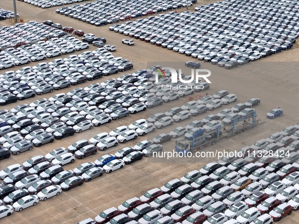 Chinese domestic vehicles are being assembled at Yantai Port in Shandong province, in Yantai, China, on June 13, 2024, waiting to be loaded...