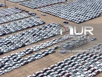 Chinese domestic vehicles are being assembled at Yantai Port in Shandong province, in Yantai, China, on June 13, 2024, waiting to be loaded...