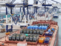 A batch of Chinese-made trucks is being loaded for export at Yantai Port in Shandong province, in Yantai, China, on June 13, 2024. Data rele...