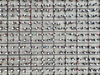 Primary school students are demonstrating basketball exercises at a school in Suqian, Jiangsu province, China, on June 14, 2024. (