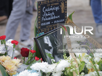 Artur Snitkus, a 36-year-old Ukrainian serviceman, artist, musician, stylist, and queer community member, is being pictured during the funer...