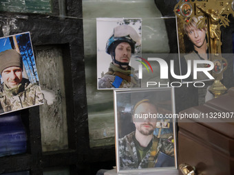 Photographs are being pictured during the memorial service of Ukrainian serviceman, artist, musician, stylist, and queer community member Ar...