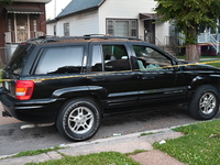 A vehicle is being damaged by bullet holes at the crime scene. Four people are being shot in a mass shooting in Chicago, Illinois, United St...