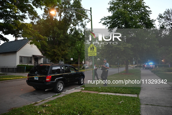 Chicago police are searching a vehicle damaged by bullet holes at the scene of the mass shooting. Four people are being shot in a mass shoot...