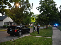 Chicago police are searching a vehicle damaged by bullet holes at the scene of the mass shooting. Four people are being shot in a mass shoot...