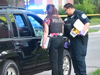 Chicago police are searching a vehicle damaged by bullet holes at the scene of the mass shooting. Four people are being shot in a mass shoot...